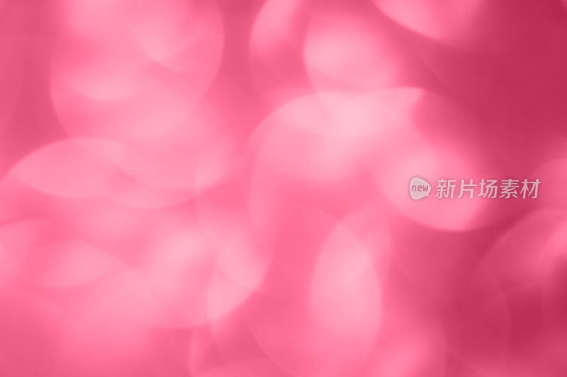 A magenta abstract bokeh bubble background – 2023 color of the year